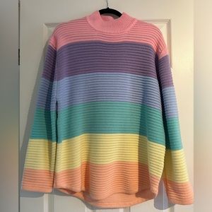 Women’s pastel rib strike knit sweater.